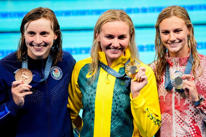 Katie Ledecky (USA), Ariarne Titmuus (Australia) and Summer McIntosh (Canada) in the women’s 400-meter freestyle medal ceremony during the Paris 2024 Olympic Summer Games at Paris La Défense Arena.