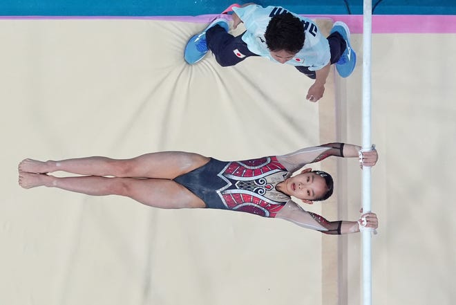 Haruka Nakamura of Japan performs on the uneven bars in womenÕs qualification during the Paris 2024 Olympic Summer Games at Bercy Arena.