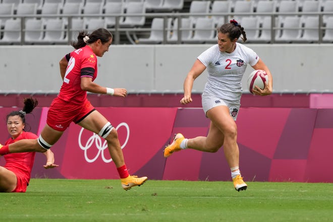 Ilona Maher outruns runs HT Ruan (CHN) during the Women's Rugby Sevens vs. China at the Tokyo Olympics on Saturday, July 31, 2021.